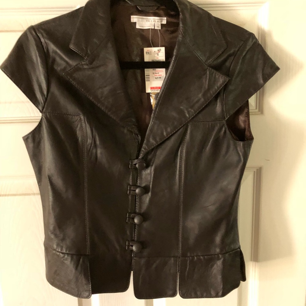 Soft Brown leather button up vest.